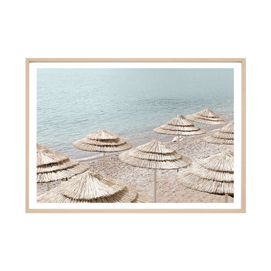 Beachfront Parasols Framed Print